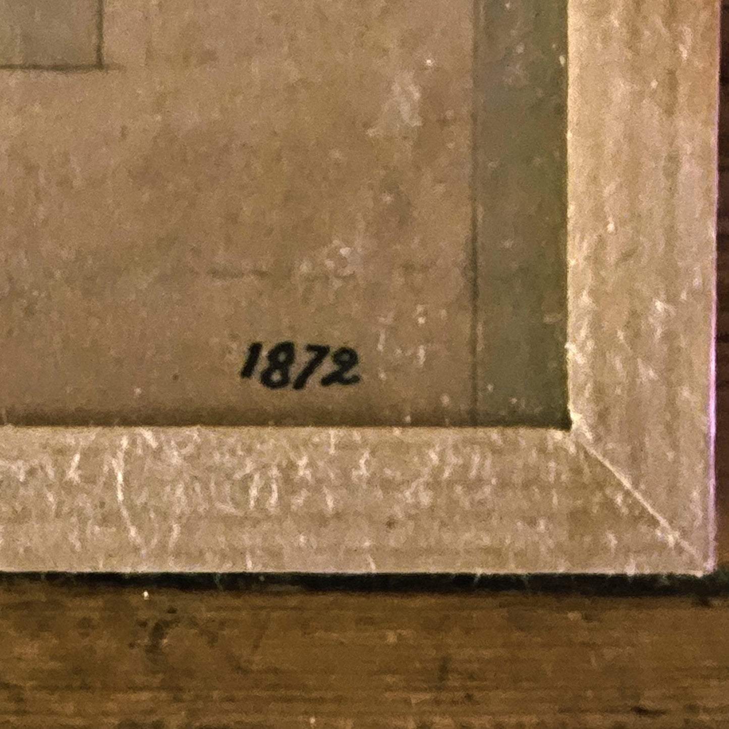 Gros plan sur la date « 1872 » inscrite en bas à droite du plan d'architecture de Paul Friesé, à l'encre noire