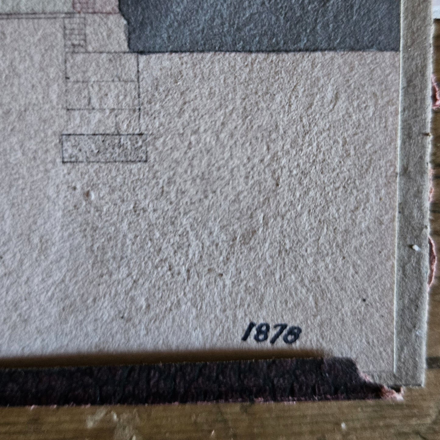 Gros plan sur la date « 1878 » inscrite en bas à droite de l'aquarelle de Paul Friesé, à l'encre noire sur le papier vergé texturé beige.